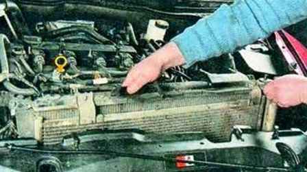 How to replace Mazda 6 engine cooling radiator