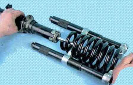 Disassembly and assembly of the shock strut of a Mazda 6