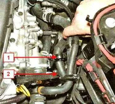 How to remove the thermostat and thermostat housing of a Nissan Almera car