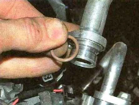 Cómo quitar el compresor del aire acondicionado Nissan Almera