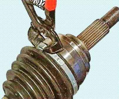How to replace Nissan Almera wheel drive shaft covers