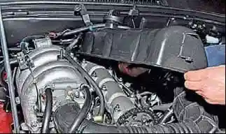 Removing the cylinder head of the VAZ-2123 engine