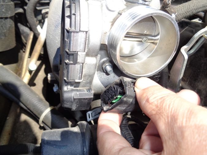 How to remove and install an electric throttle assembly VAZ-2123