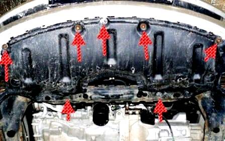 Desmontaje de la tapa decorativa y guardabarros del motor Mazda 6