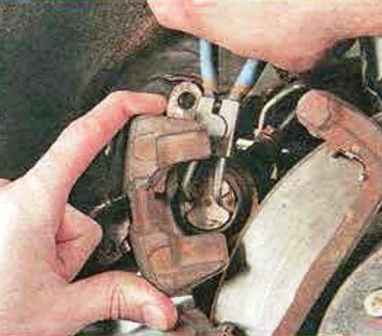 Repair of rear wheel brake mechanisms Mazda 6