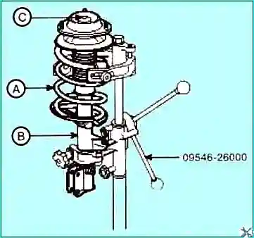Removing and repairing the shock strut