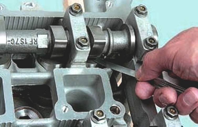 How to adjust Mazda 6 engine valve clearances