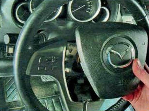 Removing steering wheel and steering column covers Mazda 6