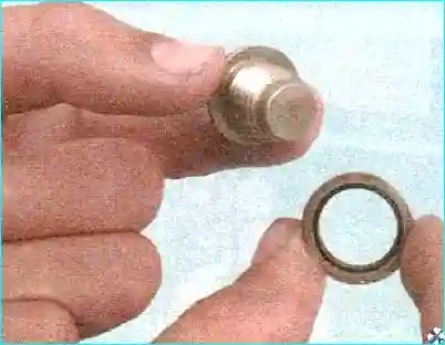 Renault Замена масла в двигателе и масляного фильтра Renault Logan