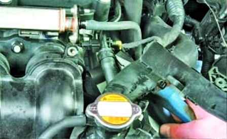 Removal and installation of the inlet pipe of the Hyundai Solaris engine