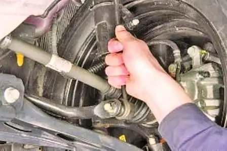 Checking the front suspension of the Hyundai Solaris