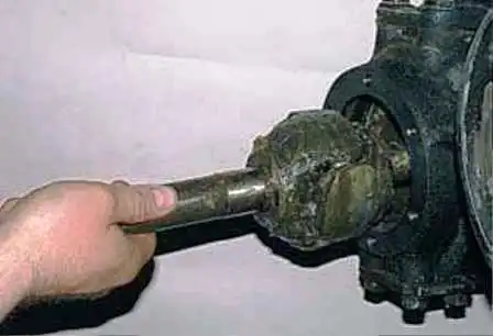 How to replace the front axle shaft and remove the steering knuckle of a UAZ car