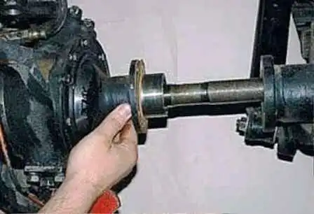 How to replace the front axle shaft and remove the steering knuckle of a UAZ car