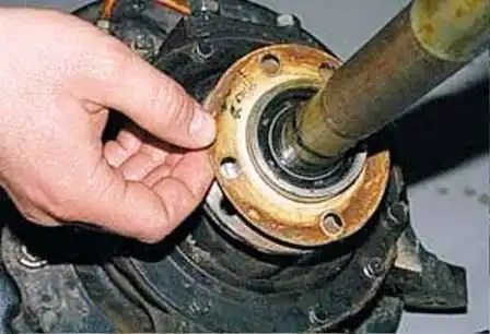 How to replace the front axle shaft and remove the steering knuckle of a UAZ car