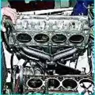 Removing the cylinder head of the VAZ-2123 engine