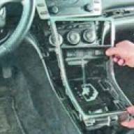 Removal and installation of the floor tunnel of the car Mazda 6