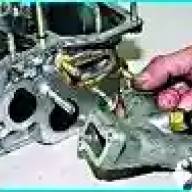 Dismantling the cylinder head VAZ-2123