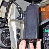Removal and installation of an adsorber of the Renault Duster car