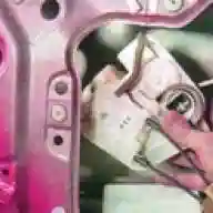 Removing the handles and locks of the front door of a Mazda 6 car