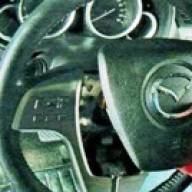 Removing the steering wheel and steering column covers Mazda 6