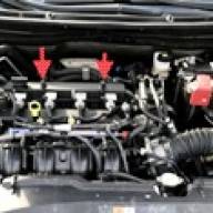 Removal of the decorative casing and mudguard of the Mazda 6 car engine