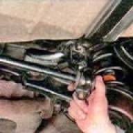 Removing the rear suspension stabilizer of a Mazda 6 car